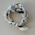 Liten scarf med magnet, prickig offwhite/svart
