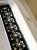 Maja – Black & White Flower, knappsmycken 6-pack, svart/guld